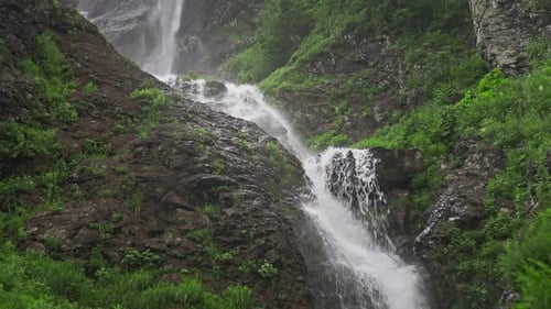 A Beautiful Tropical Waterfall Water From a Mountain River Falls Down the Stone Cascades Pure Water