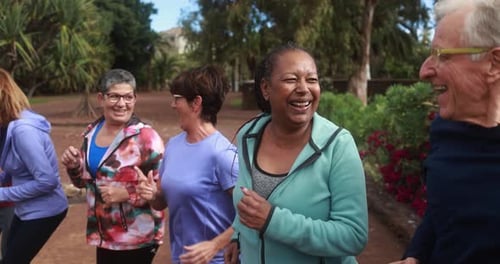 Senior Friends Running in the Park
