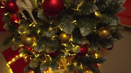 The Christmas Tree and Gifts are the Centerpiece of the Christmas Interior Which Fills Every Area of