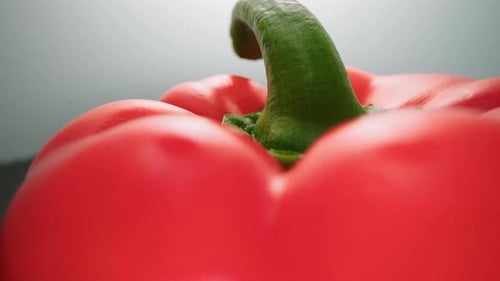 Extreme Close-Up of Fresh Red Bell Pepper with Water Droplets – 4K Footage