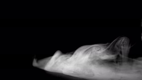 Background Video of Smoke Creeping Across the Ground