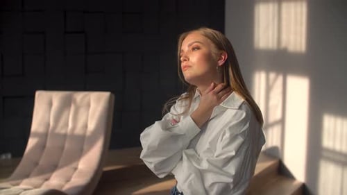 Young Woman Posing in Sunlight
