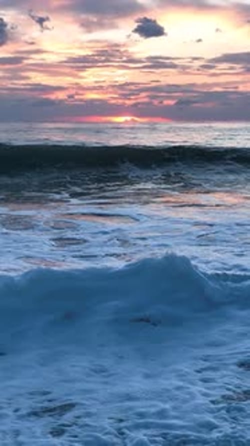 Vertical Video Slow Motion Coastal Seduction Sensational Footage of a Twilight Serenade at Sea