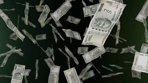 500 Indian Rupee bills falling down. Banknotes. Money rain.
