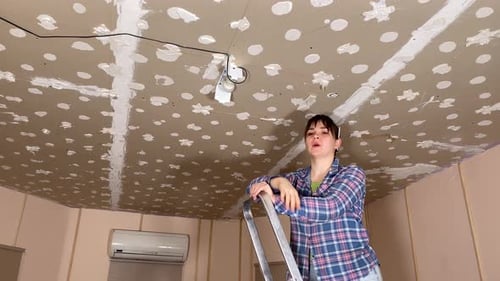 Woman DIY in home improvement