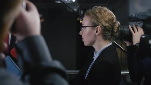 Woman Giving a Press Conference Interview