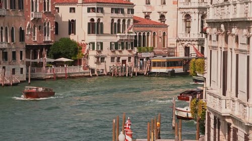 Traditional Gondolas in Venice Sailing Through the Narrow Canals Near Famous Canal Grande