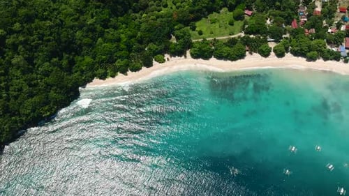 Beach and Ocean Waves on Coastline of Samal Island Davao Philippines