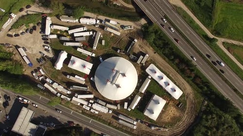 Travelling Circus on Road in Small Village Top View