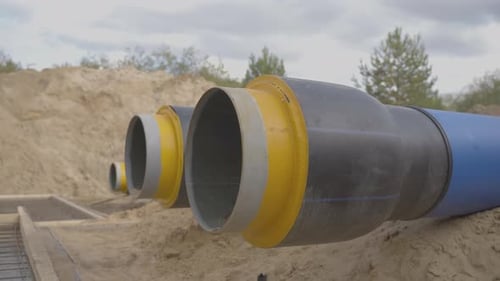 Pipes Laying on Ground at Construction Site