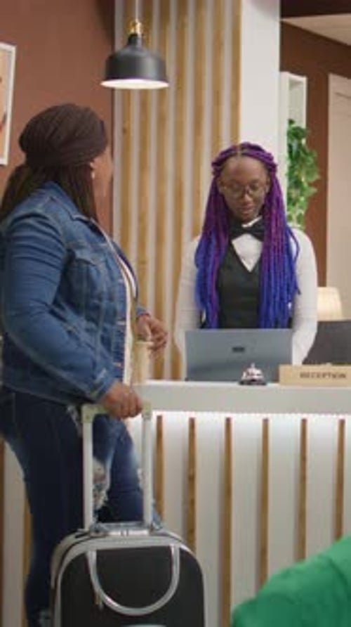 Vertical Video Hotel Concierge Welcoming Guests