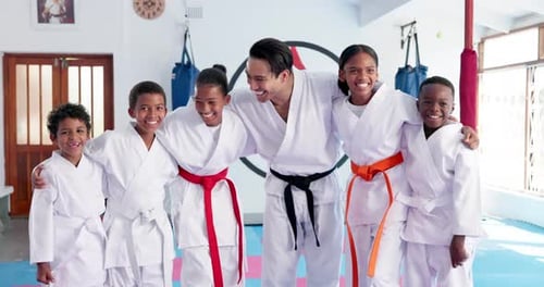 Group of Smiling Martial Arts Students with Instructor