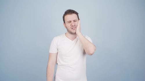 Man with toothache.