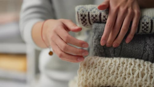 Hands Folding Soft Wool Knitwear Stack