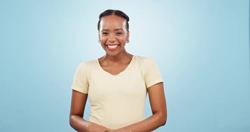 Face, happy black woman and laugh in studio with confidence, joke and good mood on blue background