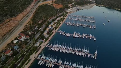 Beautiful view of the beach with boats, pure nature, sea and ships. Shot from a drone.