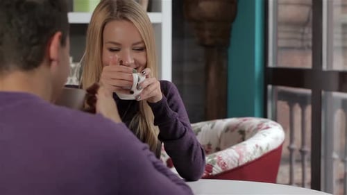 Couple Has a Date at the Cafe