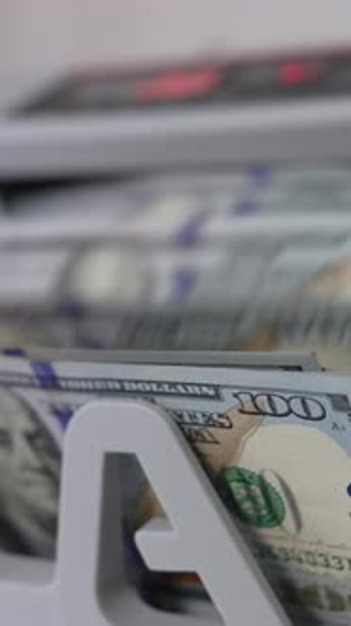 Money Counting Machine Counting One Hundred Dollar Bills