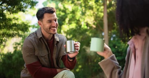 Smile, interracial couple and cheers with coffee in forest for travel date