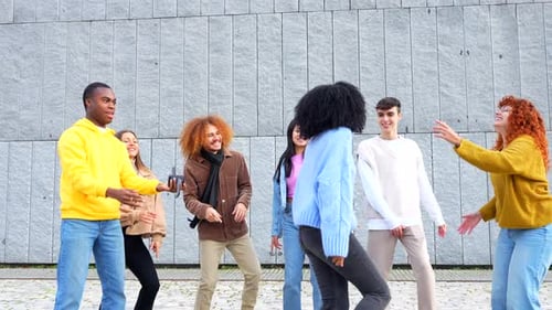 Woman Dancing in the Middle of Multiethnic Friends in the Street