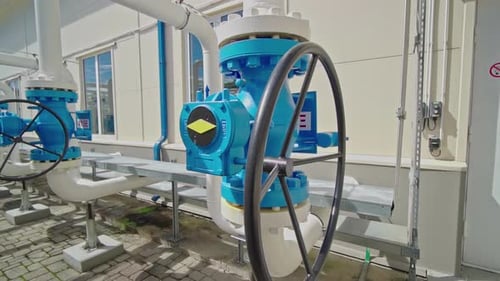 Pipe Valves And Handwheel at Natural Gas Pumping Station. - close up