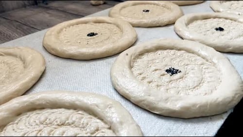 Close-Up of Traditional Flatbread Dough with Seeds