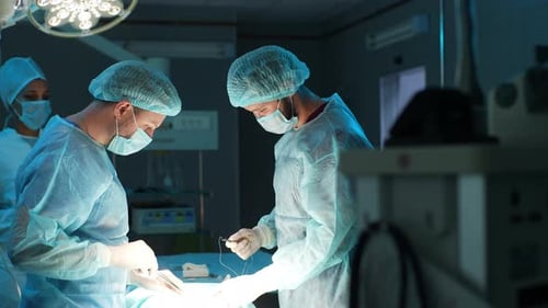 Surgeons Perform Operation in Bright Operating Room