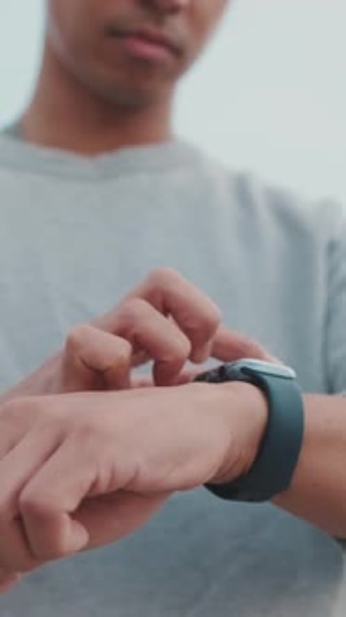 Close Up of Person Using Smart Watch