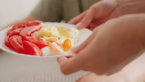 Close Up of Chef Carrying Plate of Lunch to Serve Child