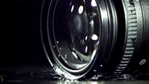Camera Lens Falling on Wet Floor Filmed on a Highspeed Camera at 1000 Fps