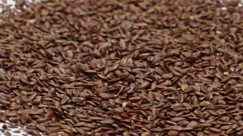 Fresh Yogurt Flax Seeds Rotation in Super Slow Motion Closeup