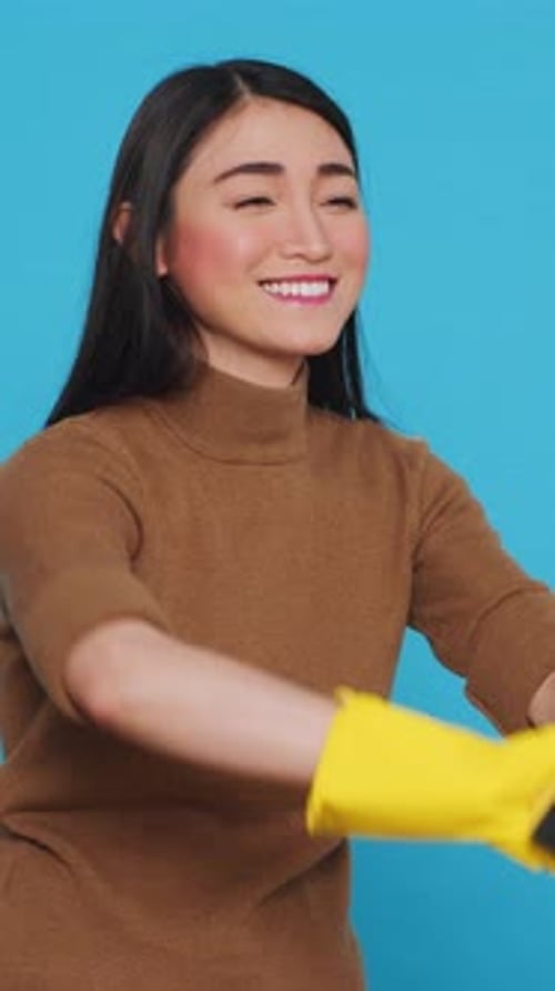 Woman in Gloves Swiping Imaginary Touchscreen