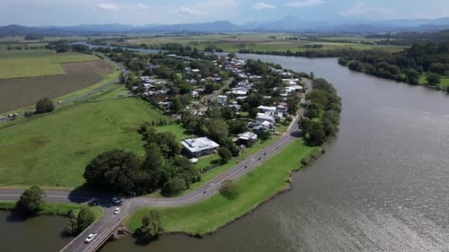 Suburbs And Tweed River, Tumbulgum In New South Wales, Australia - Aerial Drone Shot