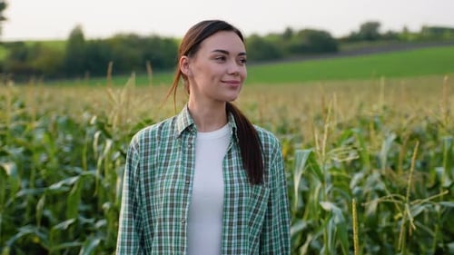 Woman Smiling in Corn Field on Farm