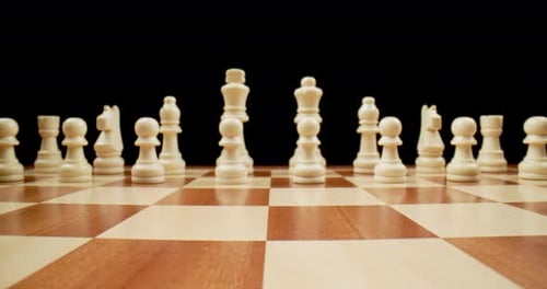 Chess Board Pieces, Macro Pull Back Across Board Between Black King and Queen, Slow Motion