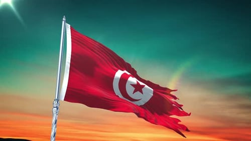 Waving Tunisian Flag Against a Sunset Sky