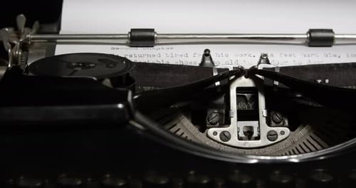 Vintage Typewriter with 'Second Chapter' on Paper