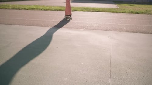 Stylish Woman Carefree Dancing in Roller Skates Outdoors