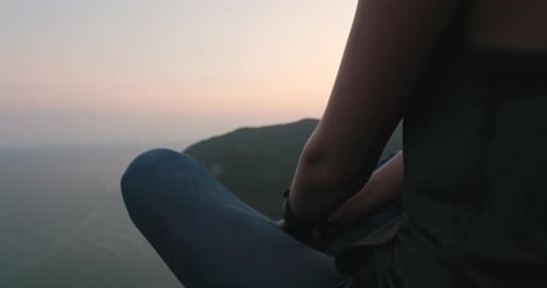 Woman Gazing Across Vast Ocean
