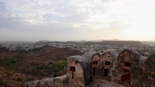 ancient historical fort with blue city view and dramatic sunset sky video is taken at mehrangarh for