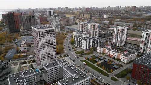 Aerial View of Apartment Buildings in a Residential Area Drone Flying Among High Rise Houses in