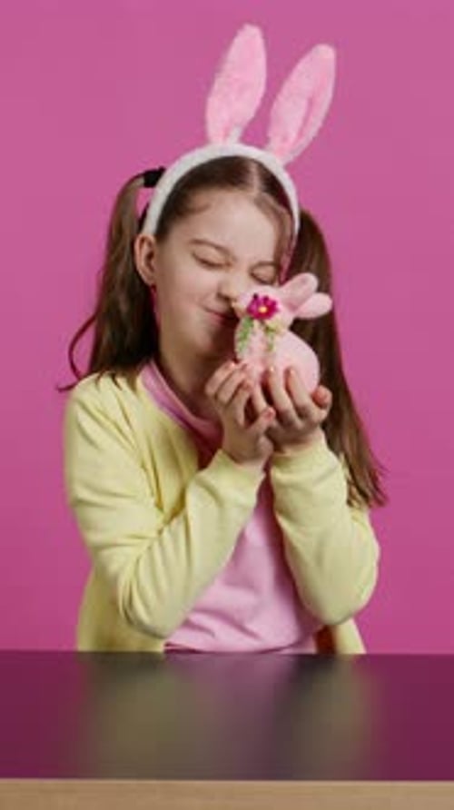 Girl with Toy Bunny Rabbit Posing