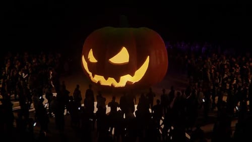 Giant Jack-o'-Lantern and Crowd for Halloween Event
