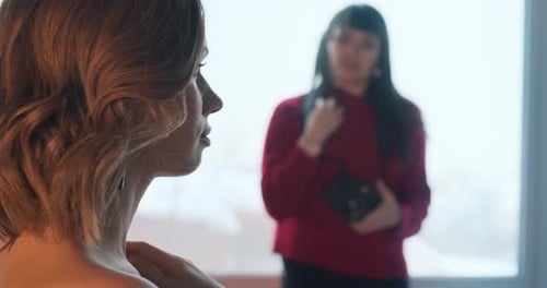 Woman Posing While Photographer Takes Picture