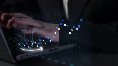 Typing on Laptop with Animated Graph Overlay