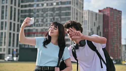 Young Friends Taking a Selfie Together in City