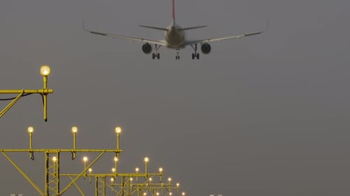 Airplane Final Approach Dusk