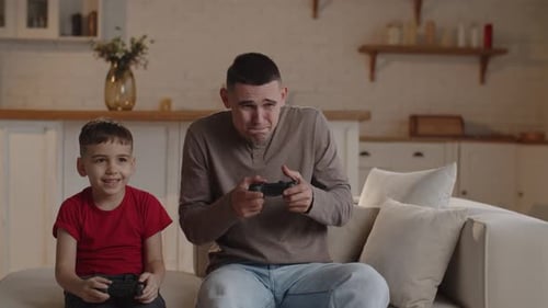 Young Adult and Child Play Video Games