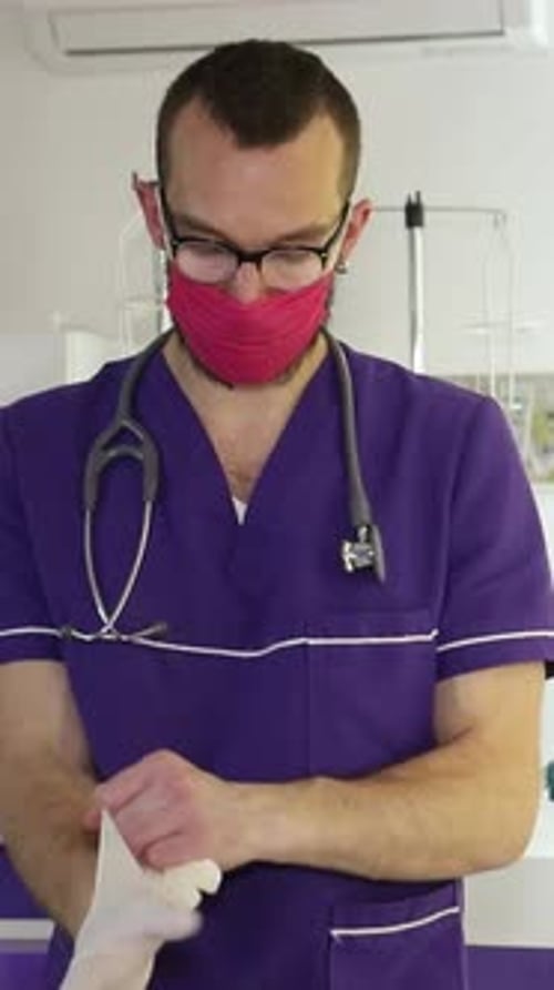 A Doctor Prepares for a Critical Procedure in a Hospital Showing Care