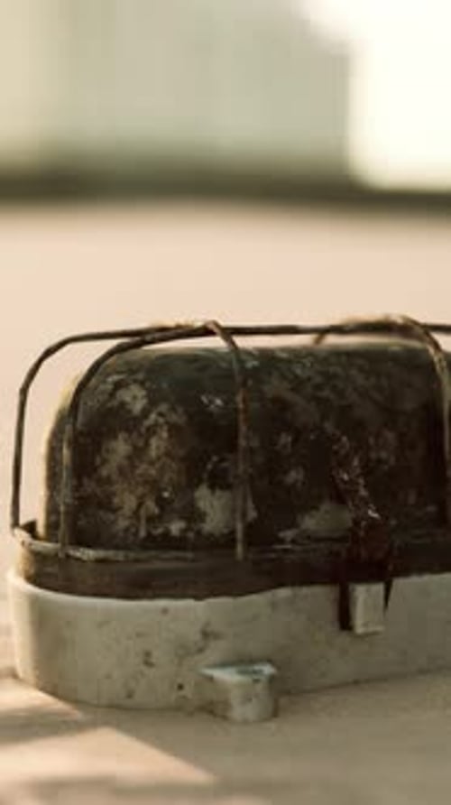 Old Rusted Trash on the Sand Beach